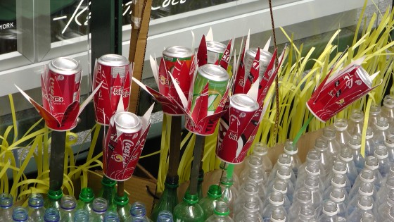 Flowers made from soda cans and cups at "Fragile" by Roadsworth and Brian Armstrong at the Eaton Centre. Flowers made from soda cans and cups at "Fragile" by Roadsworth and Brian Armstrong at the Eaton Centre.
