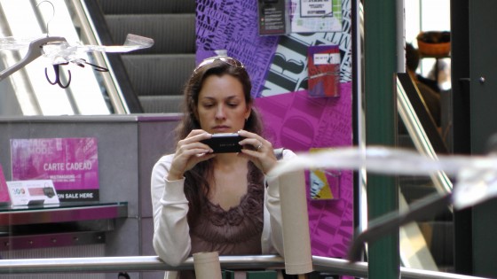 Superfluous photo of a young-ish woman taking a picture of "Fragile" by Roadsworth and Brian Armstrong at the Eaton Centre. Superfluous photo of a young-ish woman taking a picture of "Fragile" by Roadsworth and Brian Armstrong at the Eaton Centre.