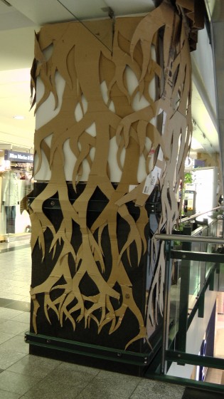 More cardboard used to cover columns.