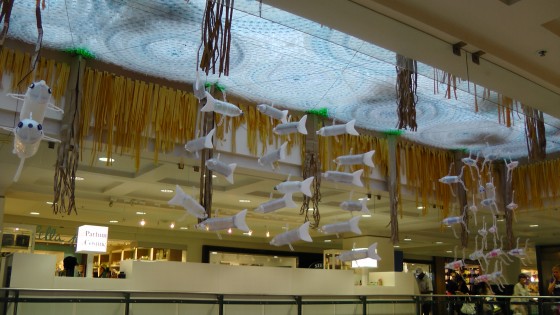 The underside of "Fragile" by Roadsworth and Brian Armstrong at teh Eaton Centre.