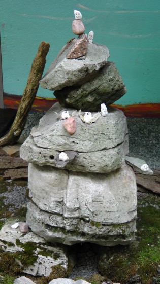 Some more small happy rocks hanging out on a larger rock.
