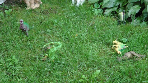 Dinosaurs resting on the lawn. Dinosaurs resting on the lawn.