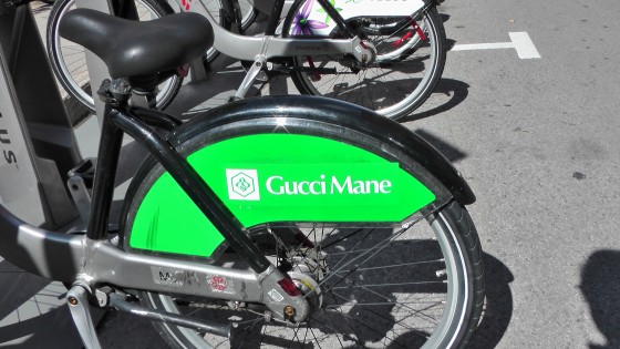 Gucci Mane on the back of a Bixi. Gucci Mane on the back of a Bixi.