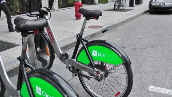 Lil B on the back of a Bixi. Lil B on the back of a Bixi.