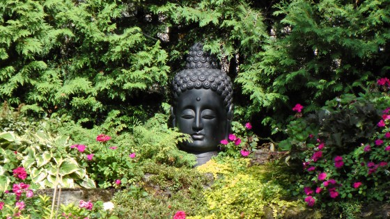 South Asian bust in a garden on Rosemont ave.