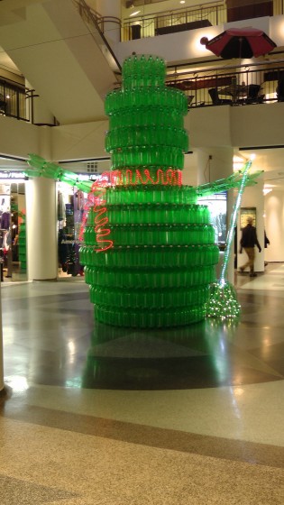 A giant green snowman made out of recycled soda bottles. A giant green snowman made out of recycled soda bottles.