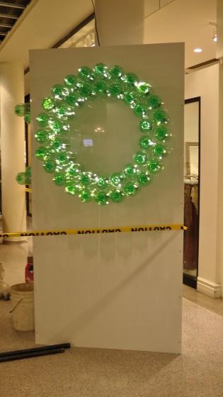 A wreath made out of recycled soda bottles. A wreath made out of recycled soda bottles.