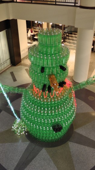 The giant snowman made out of recycled soda bottles seen from above. The giant snowman made out of recycled soda bottles seen from above.