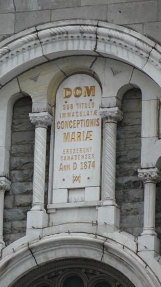 Something in Latin on the Chapelle Notre-Dame-de-Lourdes. Something in Latin on the Chapelle Notre-Dame-de-Lourdes.