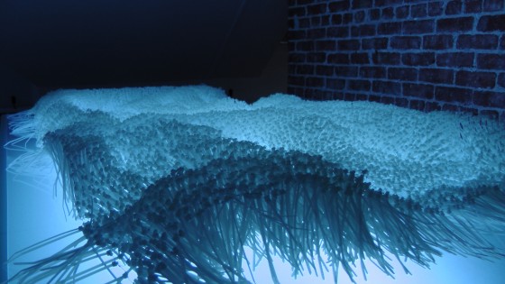 Elisabeth Picard, Flot, 2011, zip ties, glass, painted steel, fluorescent tubes, 28" x 76" x 39"